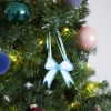 Lazos adornos para el árbol de Navidad con diseños en dos colores. Descubre nuesta tienda online con más de 100 adornos Navideños.